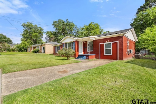 1135 E Sixth St, Tyler, TX 75701 - single story home featuring brick siding and a front lawn