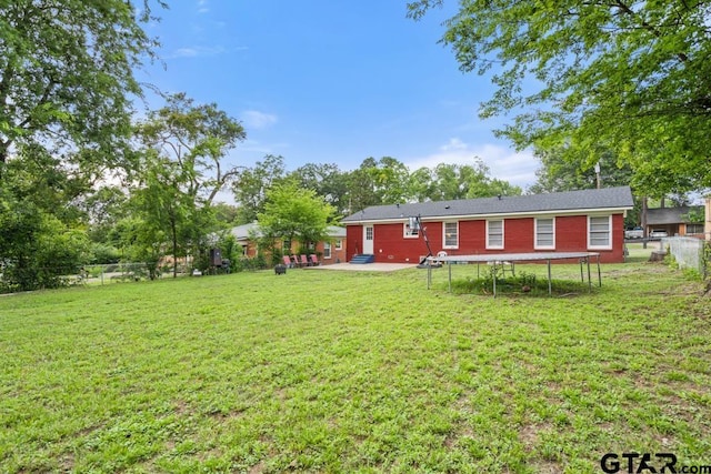 1135 E Sixth St, Tyler, TX 75701 - fenced backyard featuring a patio