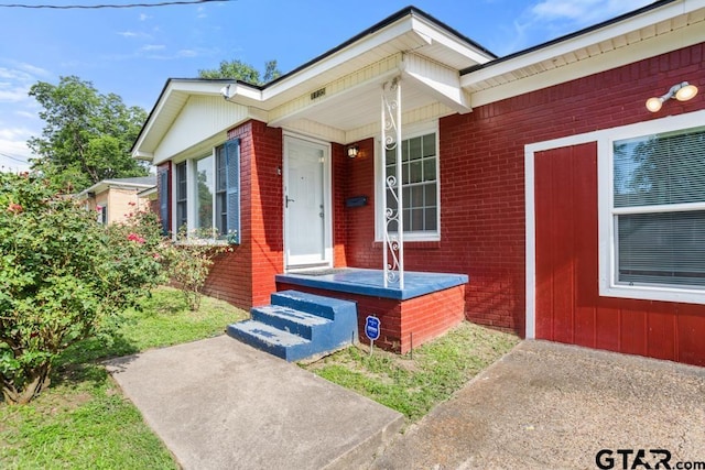 1135 E Sixth St, Tyler, TX 75701 - view of exterior entry featuring brick siding
