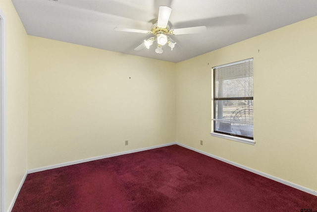 empty room with carpet floors and ceiling fan