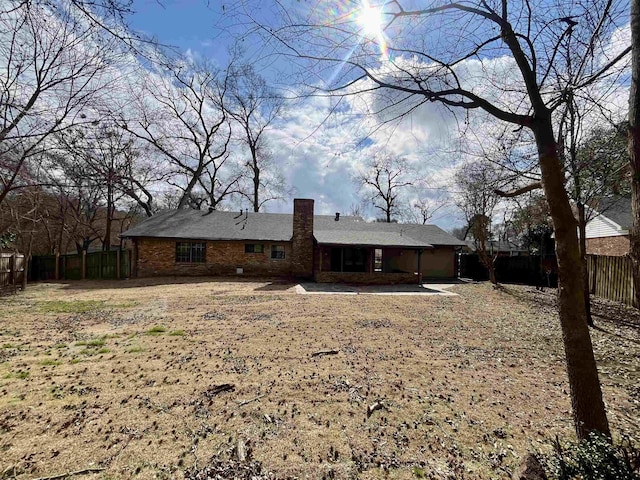 back of house featuring a patio area