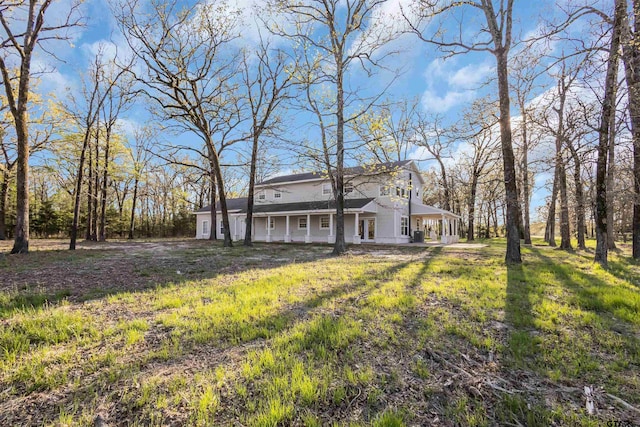 view of yard with a porch