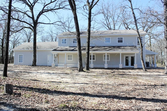 back of property featuring french doors