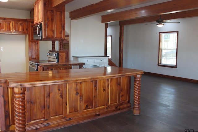 kitchen featuring appliances with stainless steel finishes, dark hardwood / wood-style floors, kitchen peninsula, beamed ceiling, and ceiling fan