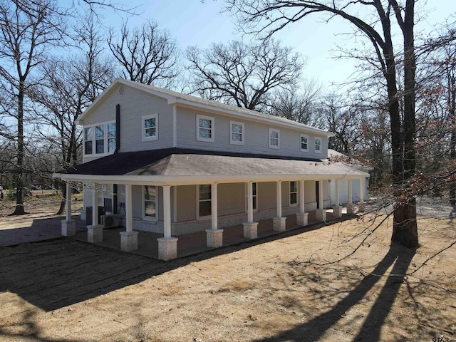 farmhouse-style home with covered porch