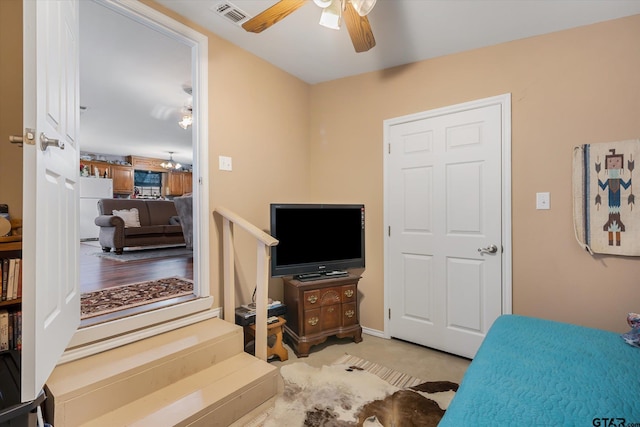 2983 Fm 17, Grand Saline, TX 75140 - bedroom featuring freestanding refrigerator and a ceiling fan
