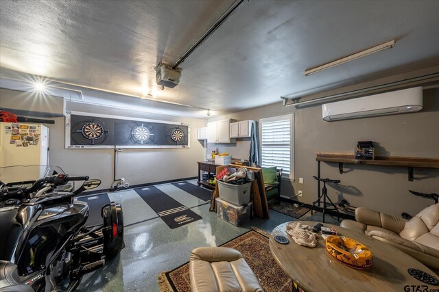 garage with white fridge, a garage door opener, and a wall mounted AC