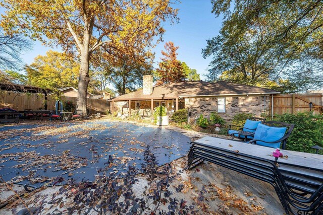 rear view of house with a patio area