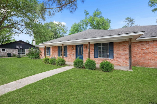 4816 Picadilly Pl, Tyler, TX 75703 - single story home with a front yard, roof with shingles, and brick siding