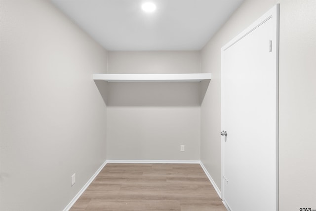 4816 Picadilly Pl, Tyler, TX 75703 - laundry area featuring wood finished floors and baseboards