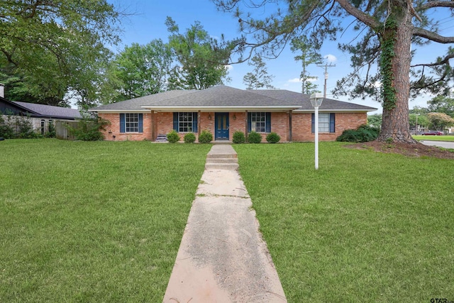 4816 Picadilly Pl, Tyler, TX 75703 - ranch-style house with a front lawn, brick siding, and roof with shingles