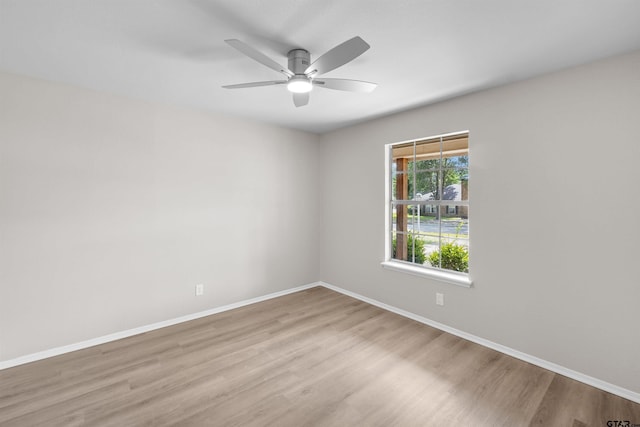 4816 Picadilly Pl, Tyler, TX 75703 - spare room with a ceiling fan, wood finished floors, and baseboards