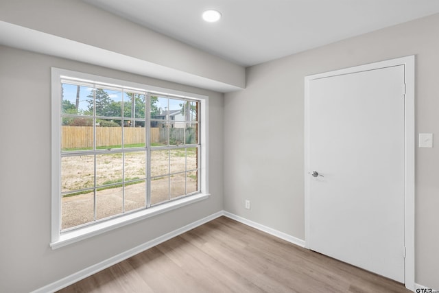 4816 Picadilly Pl, Tyler, TX 75703 - unfurnished room with wood finished floors, baseboards, and recessed lighting