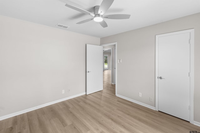 4816 Picadilly Pl, Tyler, TX 75703 - unfurnished bedroom featuring light wood-style flooring, baseboards, and a ceiling fan