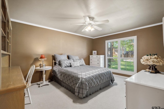 bedroom with ornamental molding, baseboards, and carpet floors