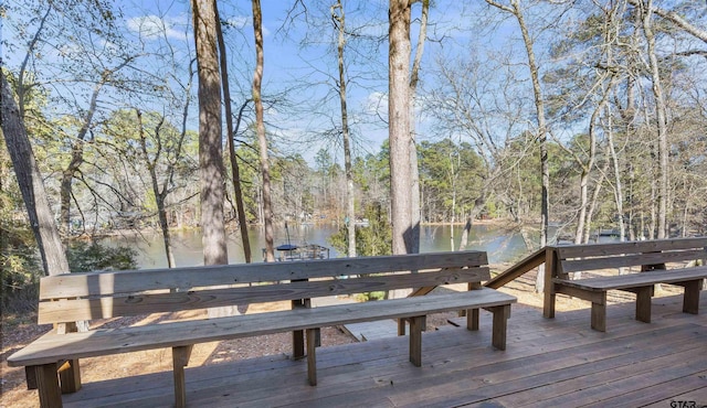 deck featuring a water view