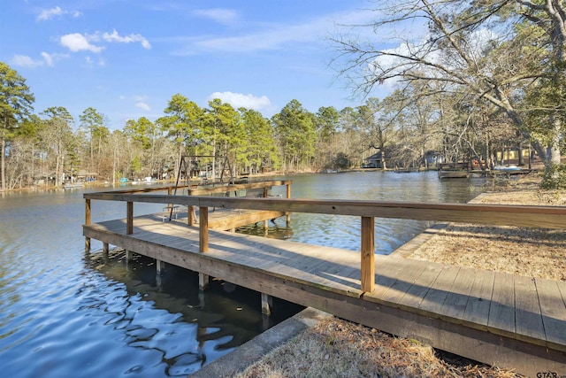 view of dock with a water view