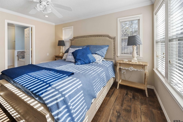 bedroom with crown molding, ceiling fan, and dark hardwood / wood-style flooring