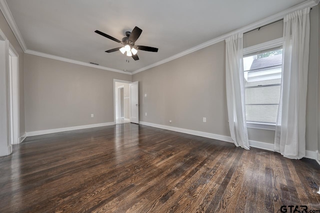 empty room featuring crown molding, ceiling fan, and dark wood-type flooring