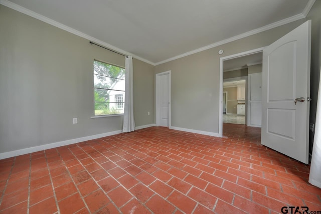 unfurnished room featuring crown molding