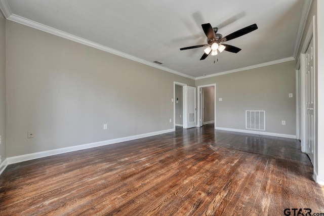 empty room with ceiling fan, crown molding, and dark wood-type flooring