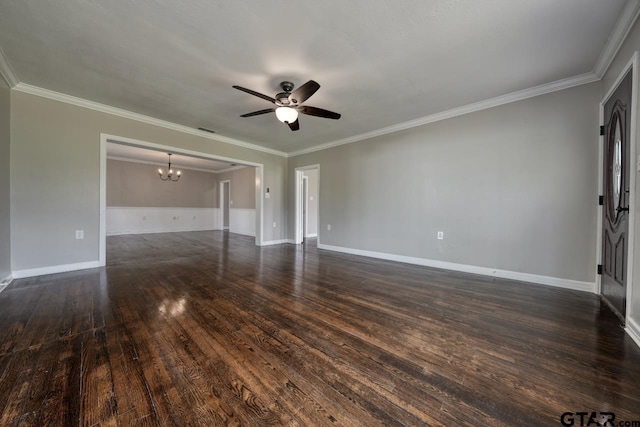 empty room featuring ceiling fan with notable chandelier, dark hardwood / wood-style flooring, and ornamental molding