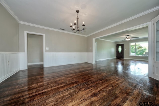 unfurnished room featuring ceiling fan with notable chandelier, dark hardwood / wood-style floors, and ornamental molding