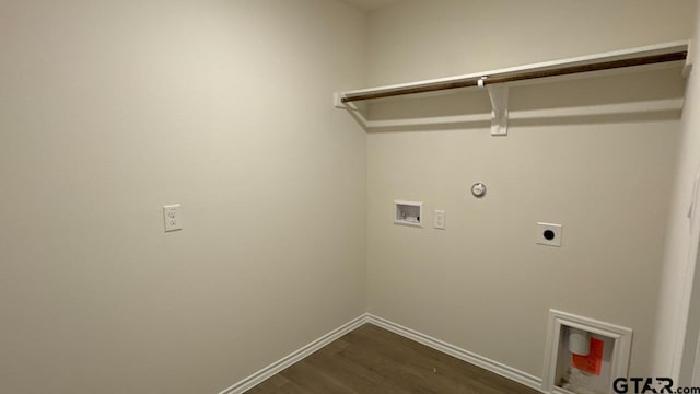 laundry area featuring hookup for a gas dryer, hookup for a washing machine, dark hardwood / wood-style floors, and hookup for an electric dryer