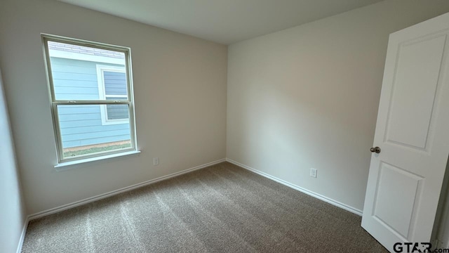 view of carpeted spare room