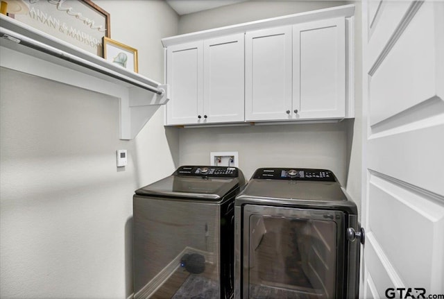 1802 Forestdale Blvd, Whitehouse, TX 75791 - laundry area featuring washing machine and clothes dryer and cabinet space