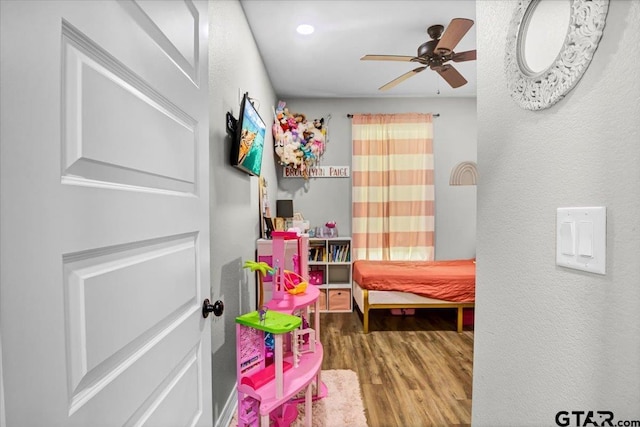 1802 Forestdale Blvd, Whitehouse, TX 75791 - bedroom featuring wood finished floors and a textured wall