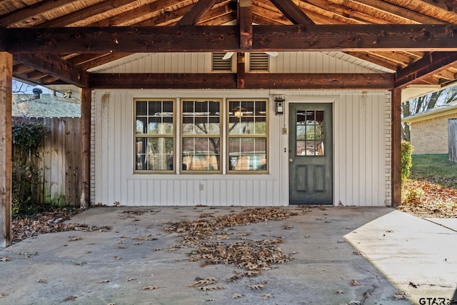 doorway to property with a patio area