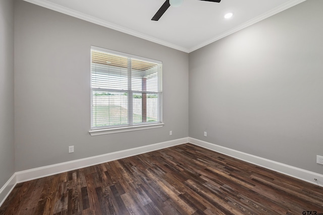 empty room featuring ceiling fan, crown molding, and dark hardwood / wood-style flooring