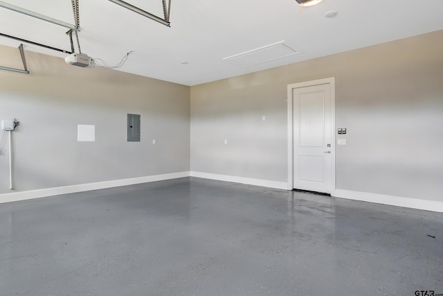 garage with electric panel and a garage door opener