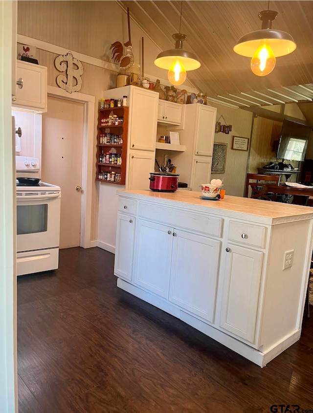 kitchen with white cabinets, lofted ceiling, dark wood-type flooring, and white electric range oven