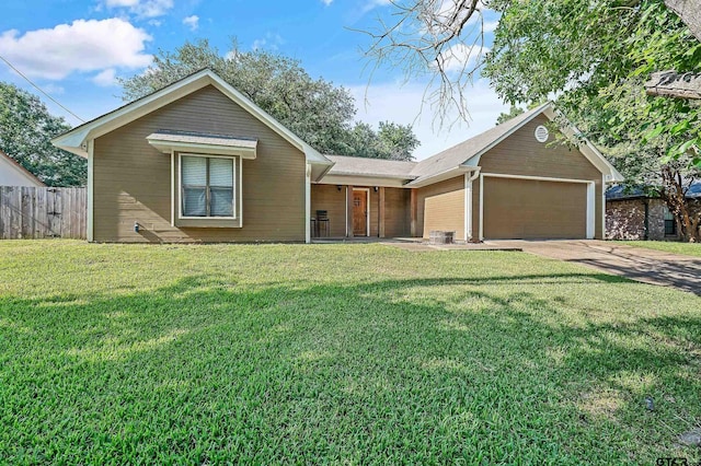 view of front facade featuring a garage and a front lawn