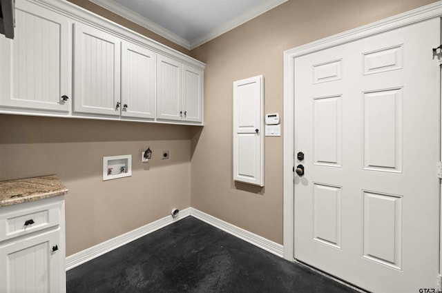 washroom with hookup for an electric dryer, cabinets, crown molding, and hookup for a washing machine