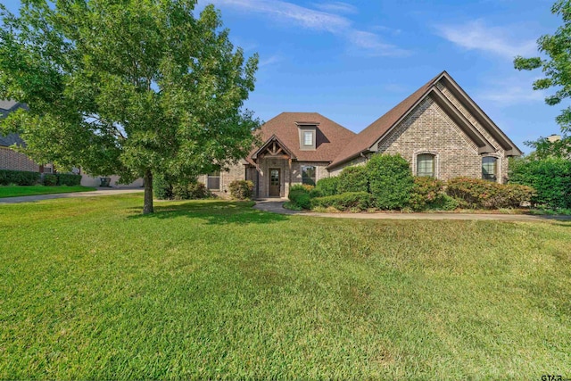 view of front of property with a front lawn