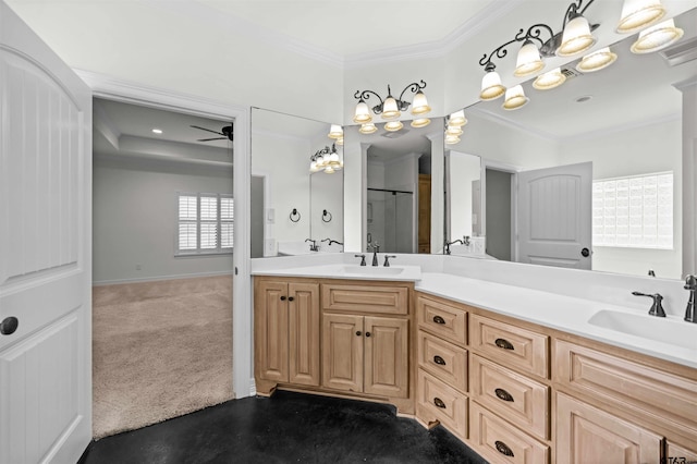 bathroom featuring vanity, ceiling fan, and ornamental molding