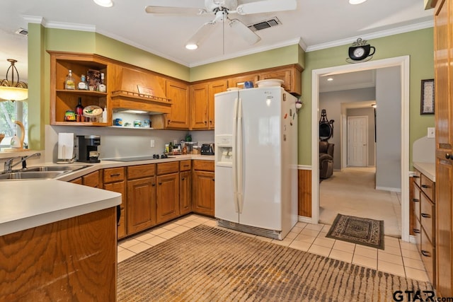 kitchen with black electric stovetop, sink, white refrigerator with ice dispenser, ornamental molding, and light tile patterned flooring