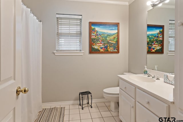 bathroom featuring vanity, tile patterned flooring, toilet, and ornamental molding