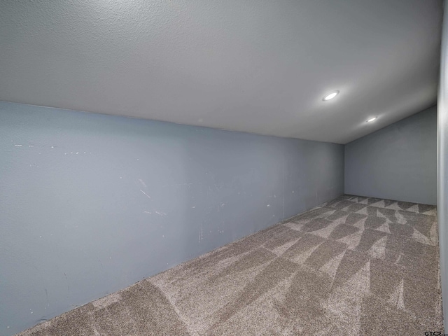17795 Lookout Ln, Flint, TX 75762 - spare room featuring recessed lighting, vaulted ceiling, and carpet