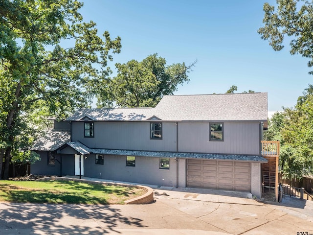 17795 Lookout Ln, Flint, TX 75762 - view of front of property with concrete driveway, roof with shingles, an attached garage, fence, and brick siding