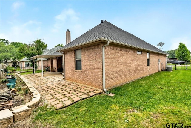 view of home's exterior with a lawn, a patio area, and central air condition unit