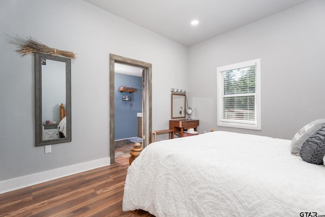 bedroom featuring dark wood-type flooring