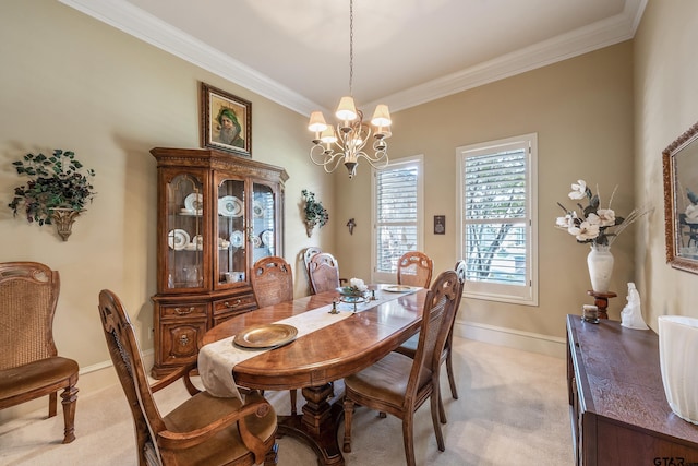 carpeted dining area featuring a chandelier and crown molding