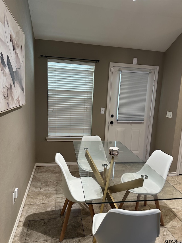 dining space with baseboards