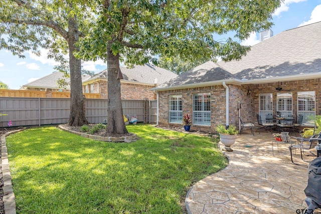 265 Bunker Dr, Tyler, TX 75703 - view of yard featuring a patio and a ceiling fan