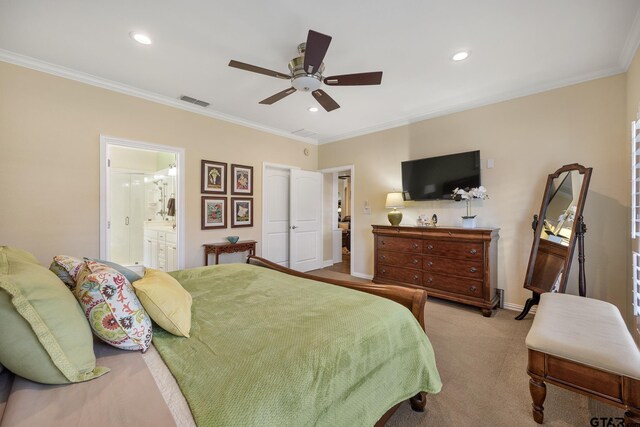 265 Bunker Dr, Tyler, TX 75703 - carpeted bedroom featuring crown molding, recessed lighting, ensuite bath, and ceiling fan