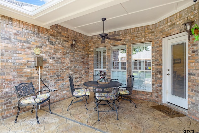 265 Bunker Dr, Tyler, TX 75703 - view of patio with ceiling fan and outdoor dining space